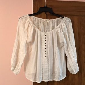 White long sleeved blouse with buttons